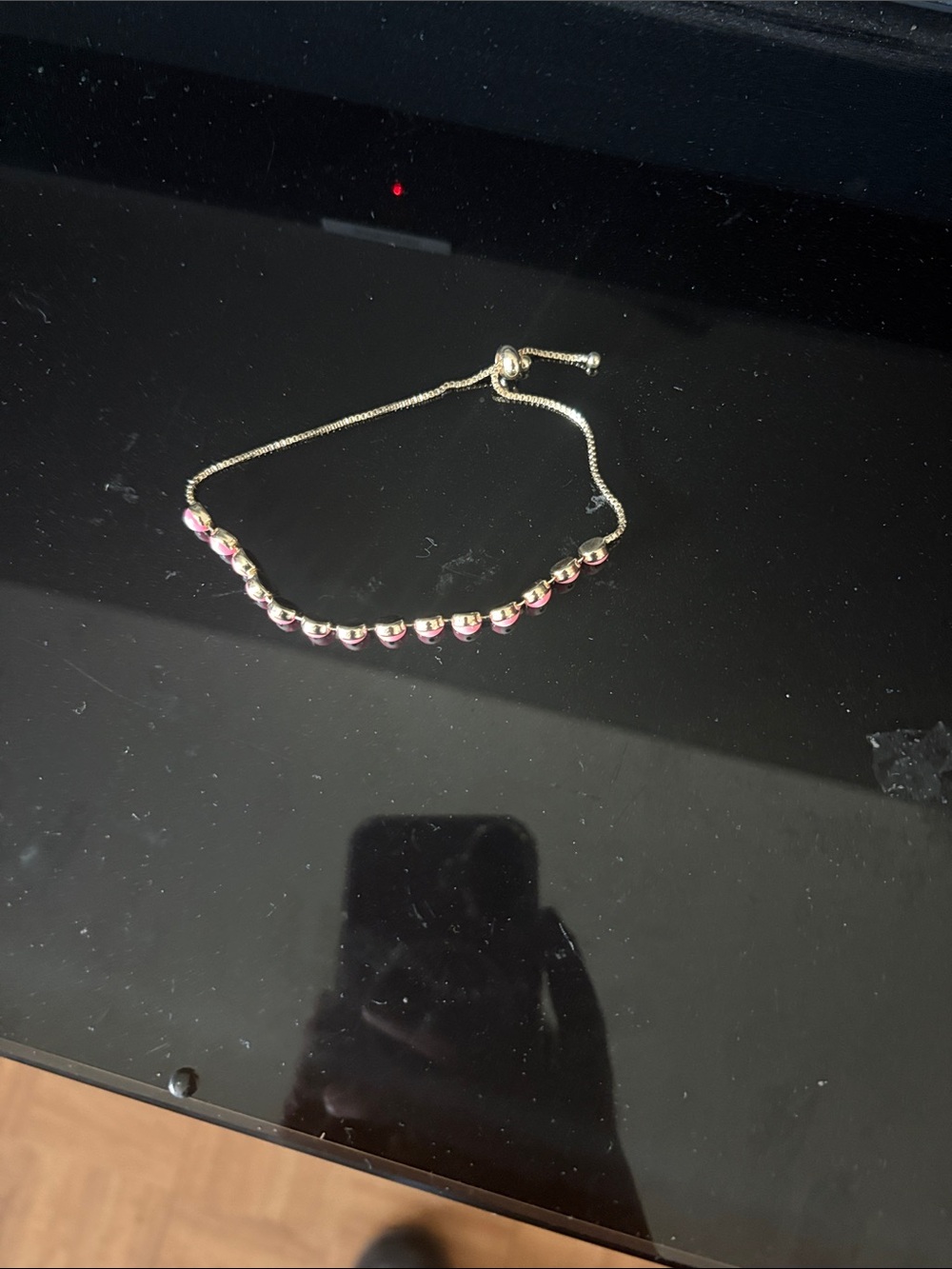 Silver Adjustable Bracelet with Pink Bead Details